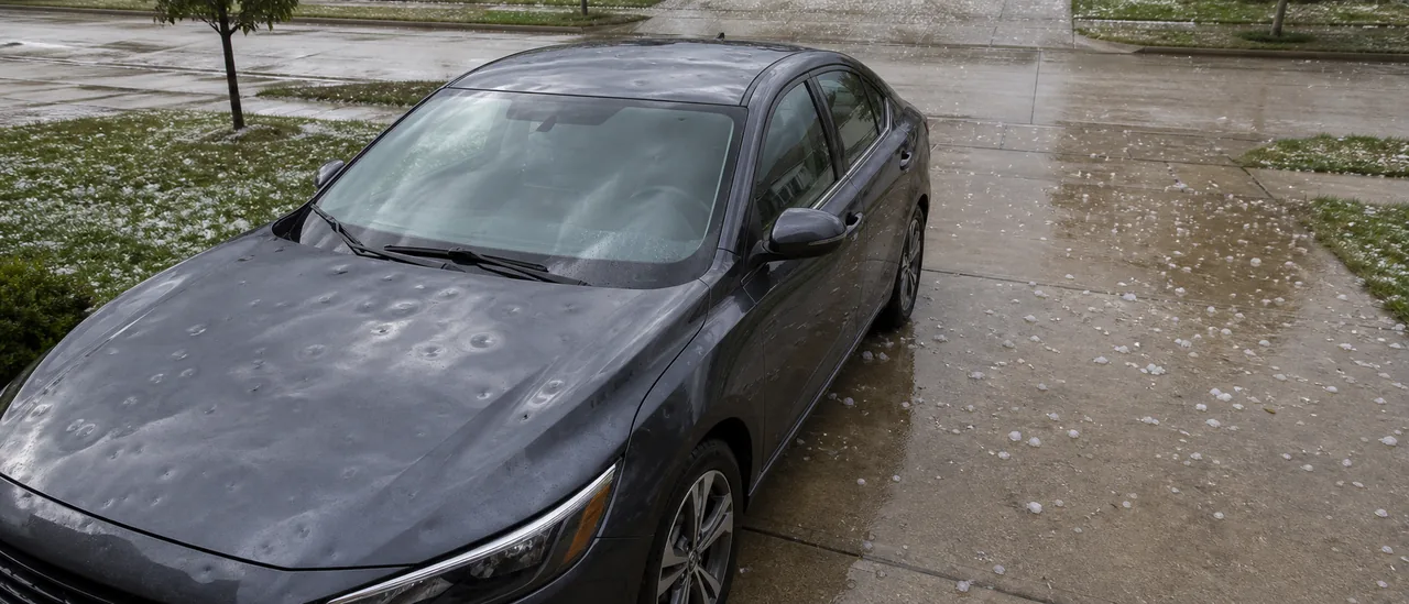 Educational illustration explaining will 1-inch hail total a car.