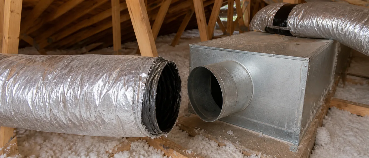 Disconnected flexible HVAC supply duct in an accessible residential attic