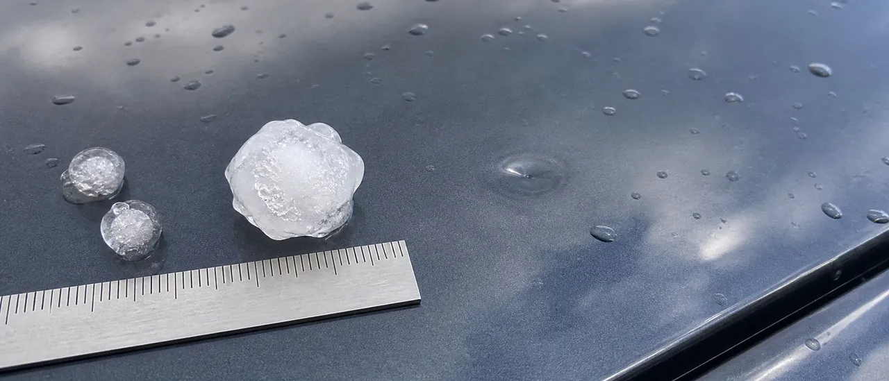 Educational illustration explaining what size hail can damage a car.