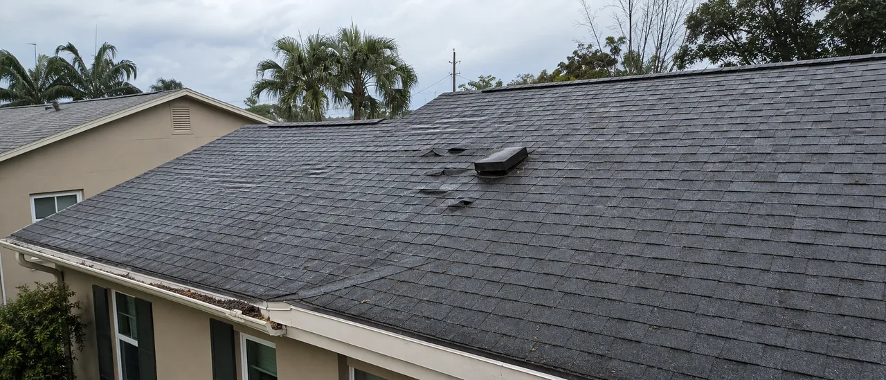 Educational illustration explaining what roof damage can a tropical storm cause.